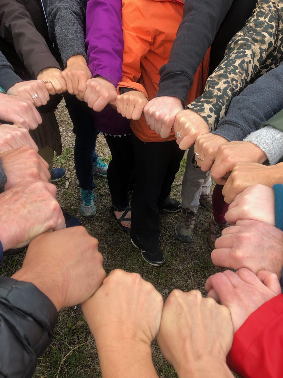 circle of people's hands